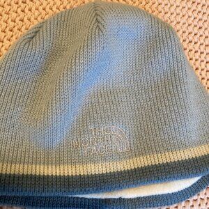 The North Face Youth/Junior Beanie Hat Blue White Lined. Measures 20.5" around
